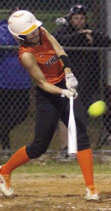 Fay Kutac connects for an RBI-triple in the bottom of the second inning against Sacred Heart. Sticker Photo By Darrell Vyvjala