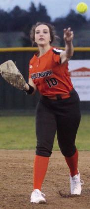 Second baseman Grace Schramek throws to first for an out in the top of the second at the Sports Complex. Sticker Photo By Darrell Vyvjala