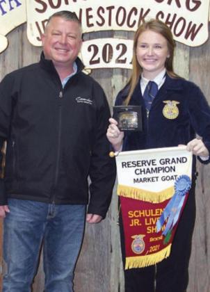 Reserve Champion market goat – Exhibitor: Taylor Limbaugh (right).