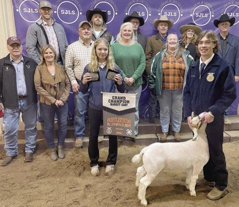 GOAT – Exhibitor: Jayse Janda (front, right). Weight: 96 pounds. Sales price: $7,000. Sticker Photo By Darrell Vyvjala