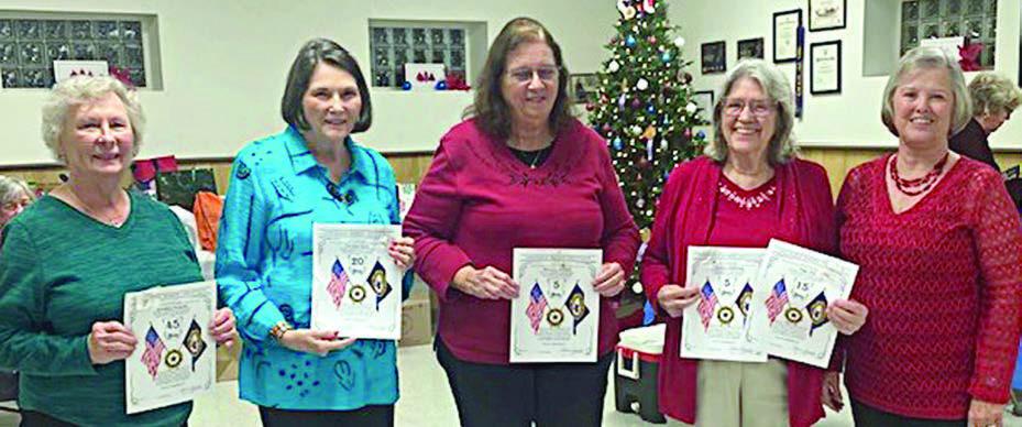 AUXILIARY SERVICE AWARDS – Auxiliary Unit 143 awards for years of service, presented in five-year intervals, went to (from left) Josephine Krupala, 45 years:; receiving for Christina Marty, 20 years, is her mother Patricia Marty; Margaret Bartosch, 5 years; Peggy Fish, 15 years; and receiving for Christine Armstrong, 5 years, is her mother Peggy Fish. Presenting the awards was Patricia Hranicky (right), Auxiliary president.