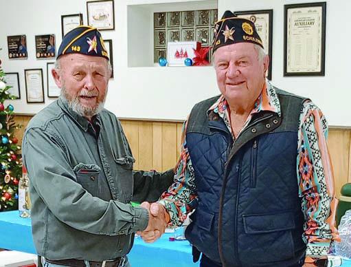 New member awards – Recognized as a new member joining Post 143 in 2025 was John Soos (left), congratulated by commander Bob Heinrich (right). Other new members not in attendance were Ranney Mc-Donnough, Wilbert Cernosek, David Lanquette and Jerome Kolensovsky.