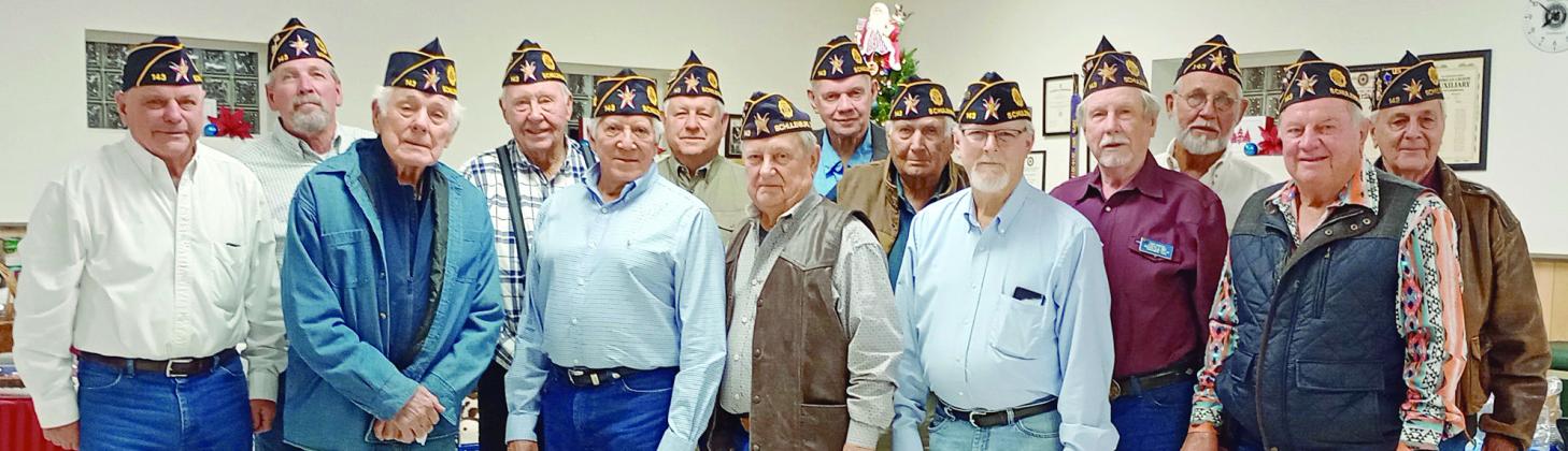Perfect At endance Awards – Members recognized for attending every meeting in 2025 were (from left) Jimmy Sumbera, Gerald Smith, Tom Marek, Alvin Hajek, Ruben Rodriguez, Jack Niesner, Robert Hranicky, Jim Brown, Ben Cerny, Michael Bartosch, Harry Bartosch, Harvey Hermis and (right) Dennis Olsovsky. Not shown are Vernon Dittrich and Paul Hunsucker. Congratulating the members was commander Bob Heinrich (second from right).