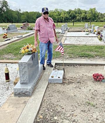 Flags placed on veterans’ graves in area cemeteries
