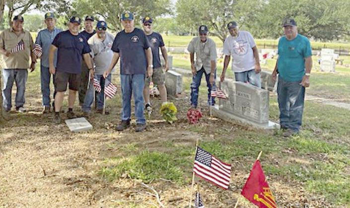 Flags placed on veterans’ graves in area cemeteries