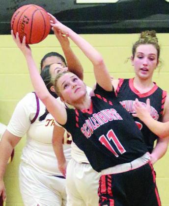 Alana Herzik intercepts a pass in the second half. Sticker Photo By Darrell Vyvjala