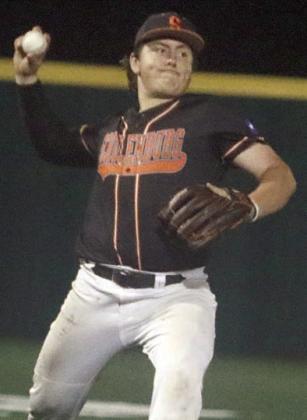 Ian Reeves fires to first base for the final out of the series. Sticker Photo By Darrell Vyvjala
