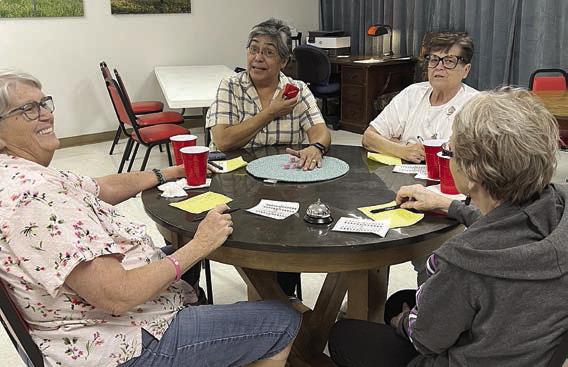 Bunco Group, Table 2, on Tuesday, Oct. 24 Table 2 included (from left) Chere Wilson, Cindy Villarreal-director who just won a round of Bunco, Julie Scott and Joan Schmidt.