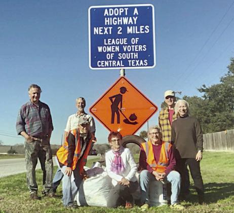 League of Women Voters group cleans along Highway 90