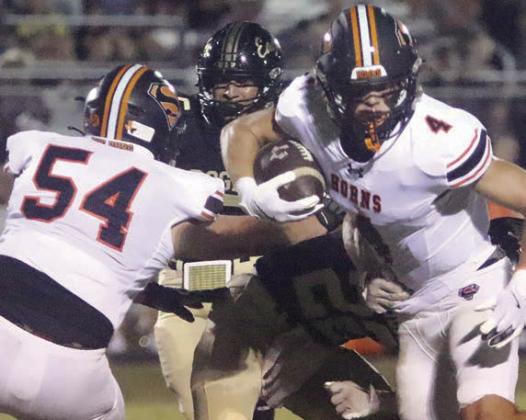 Tyson Wagner (No. 54) helps spring Jayse Janda on a screen pass that went for a 40-yard TD in the second quarter. Sticker Photo By Layne Vyvjala