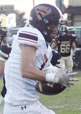 Zane Brenek secures a 39-yard reception in the first quarter. Sticker Photo By Layne Vyvjala