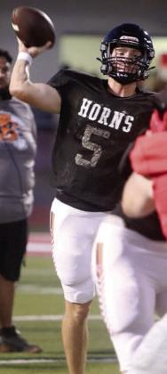 Owen Brenek delivers a pass against Columbus. Sticker Photo By Darrell Vyvjala