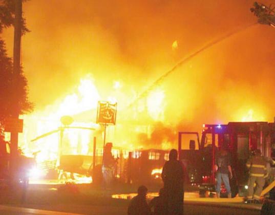 This photo of an early-morning fire that destroyed the home of a local family appeared in the Aug. 12 issue.
