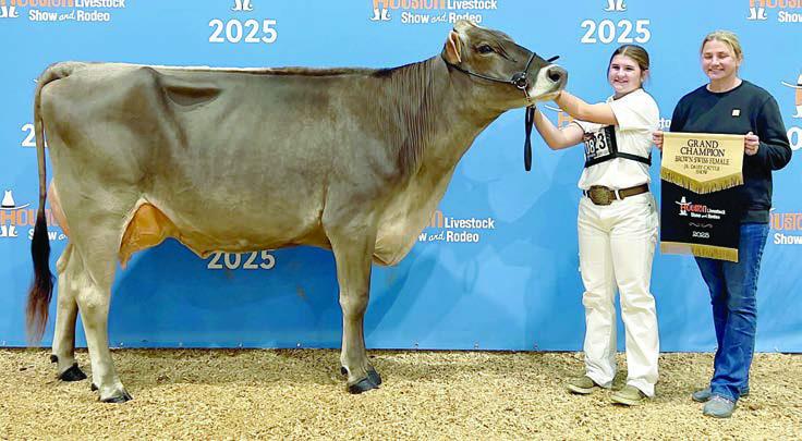 Landry Zapalac (left) won grand champion Brown Swiss female. She is shown with her mother, Melissa Zapalac (right).