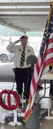 VVA Chapter 870 President Andy Janda salutes at the “Grave of the Unknown Soldier.” Sticker Photo By Darrell Vyvjala
