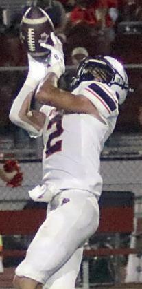 Denver Carr pulls down a long pass in the fourth quarter for an 88-yard touchown. Sticker Photo By Layne Vyvjala