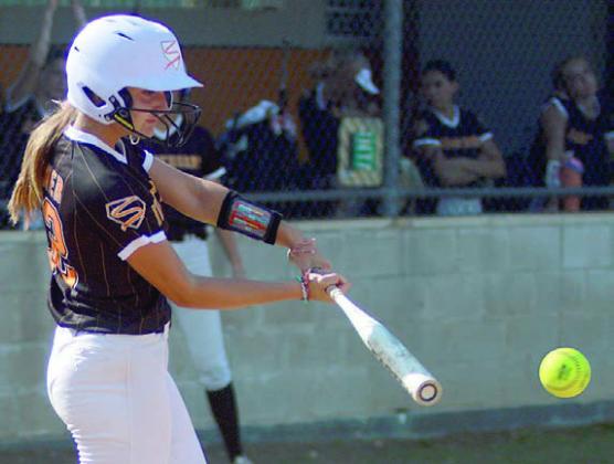 Miranda Bonner connects for an RBI-single on Thursday. Sticker Photo By Darrell Vyvjala