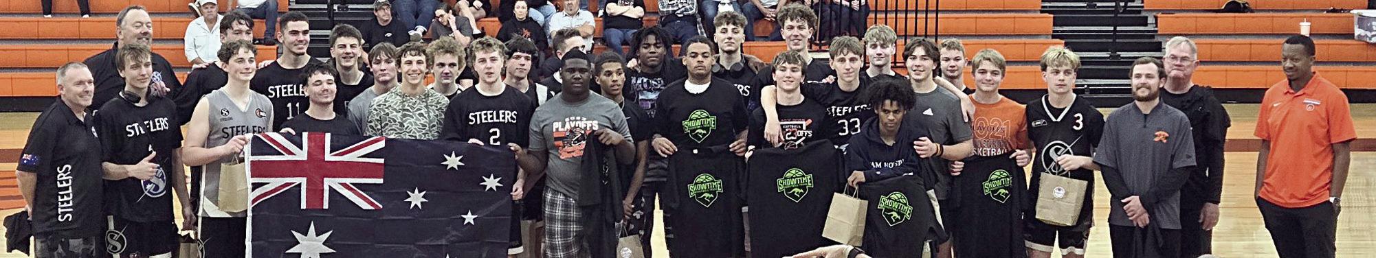 Shorthorn players and coaches exchange gifts with the Australian touring team Western Port Steelers when the Aussies came to town for the Schulenburg Christmas Tournament on Dec. 27-28.