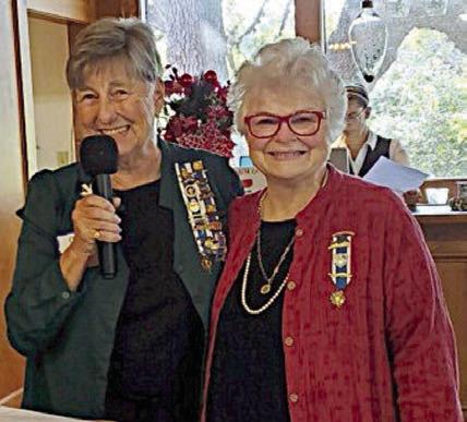 DAR District VII directo r Carol Lowe (left) spoke after being introduced by Smith-McMillan Chapter regent Pamela Burke (right).