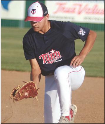 First baseman Julian Saucedo snags a hard-hit grounder in the top of the second inning. Sticker Photo By Darrell Vyvjala