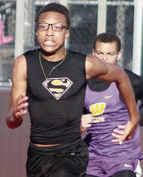 Ja’Kaden Houston sprints to first place in the 200-meter dash. Sticker Photo By Darrell Vyvjala