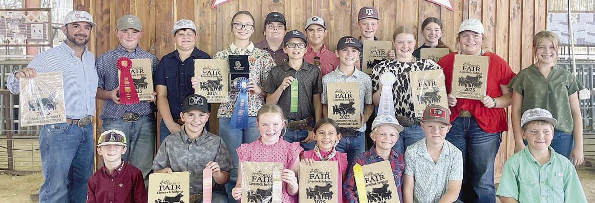 Fayette County 4-H members participating in the Austin County Livestock Judging Contest were (front row, from left) Rowdy Guenther, Hudson Holub, Abigale McBride, Emma Zweschper, Joe Carrales, Jehnsen Janecka, Parker Gabler, (back row) coach JoJo Carrales, Abraham McBride, Hunter Gabler, Tatum Fritsch, Rilan Karisch, Tate Fritsch, Dylan Zweschper, Crockett Guenther, Holden Holub, Kaisley Janecka, Laramie Laake, Rheagan Karisch, Hayleigh Pizzitola and (not shown) Adalyn Carrales.