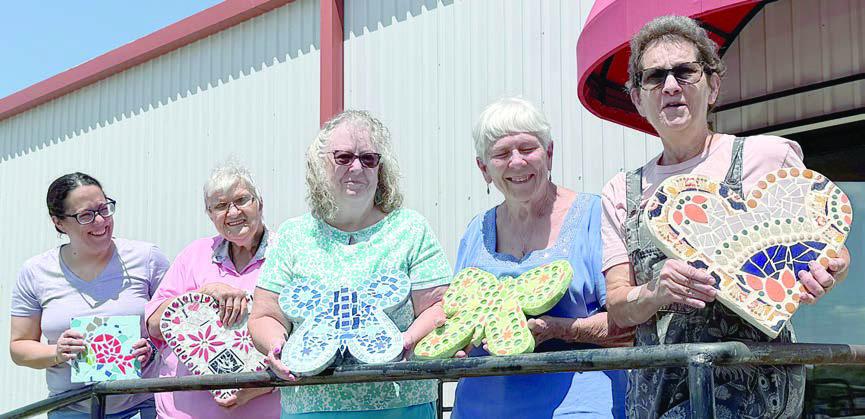 Some students in the mosaic class for Artful Friday grouted their projects recently – (from left) Fernanda Kirkwood, Cynthia Meyer, Kitra Ruiz, Mary Ann Jurica and instructor Stephanie Shroyer. To register for future mosaic classes, call the center at 979-743-3227. Senior Connections thanks Arts for Rural Texas for the partnership that makes these classes possible.