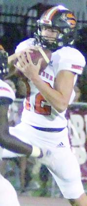 Owen Brenek comes down with an interception in the fourth quarter. Sticker Photo By Darrell Vyvjala