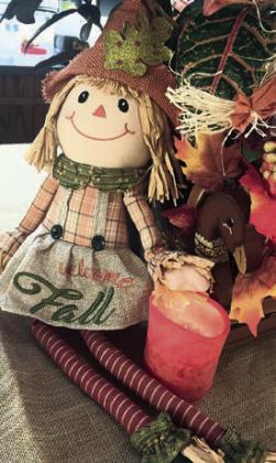 Centerpiece at the Garden Club meeting carried out the fall theme.