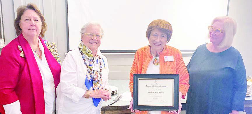 Patricia ‘Pat’ Settle (second from right) was presented the NSDAR Community Service Award at the Smith-McMillan Chapter meeting on April 20. Also shown are Kathleen Tutt (left), vice regent; Sally Reynolds (second from left), Community Service Award chair; and Sarah Mabry (right), organizing regent of the Smith-McMillan Chapter, NSDAR.