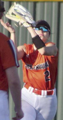 Centerfielder Fay Kutac makes a running catch against Weimar. Sticker Photo By Darrell Vyvjala
