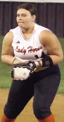 Toree Bohlmann gloves a grounder at second base to record the final out in Flatonia. Sticker Photo By Darrell Vyvjala