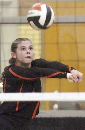 Haylee Vacek digs a Weimar attack in game four. She finished with 23 digs to go along with 20 kills. Sticker Photo By Darrell Vyvjala