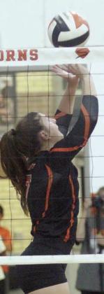 Landry Zapalac sets up a teammate in the second set for one of her 51 assists against Weimar. Sticker Photo By Darrell Vyvjala