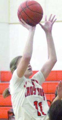 Alana Herzik hits a jumper in the lane in the second half Friday. Sticker Photo By Darrell Vyvjala