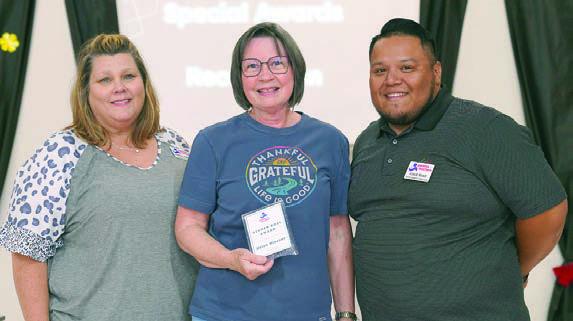 2025 Ginger Bosl Award recipient was Helen Neisner (center). Representing PAT were Karen Hoskins (left), program director,and Josue Rivas (right), development director.