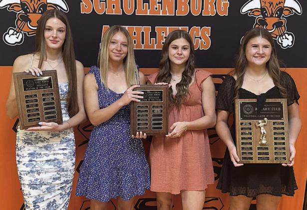 VOLLEYBALL – (from left) Emmrie Marx, Offensive MVP; Michaela Kollmann and Haylee Vacek, Defensive MVPs; and Landry Zapalac, Rotary Club Player of the Year. Sticker Photo By Darrell Vyvjala