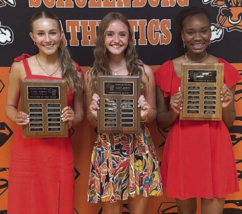 GIRLS’ BASKETBALL – (from left) Jenna Guentert, Player of the Year Award; Miranda Bonner, Offensive MVP; and Jashiya Jackson, Defensive MVP. Sticker Photo By Darrell Vyvjala