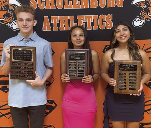 CROSS COUNTRY – (from left) Alton Herzik, John Ginn Boys’ Award; Yasmin Cortez, Girls’ Most Improved; and Ruby Rodriguez, John Ginn Girls’ Award.