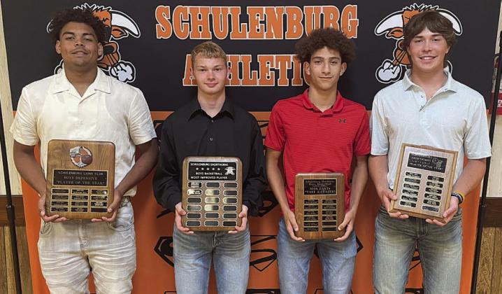 BOYS’ BASKETBALL – (from left) Jayvan Luhrs, co-Defensive MVP; Caden Herzik, Most Improved Award; Denver Carr and Jayse Janda, Iron Pants Award; and Janda, Player of the Year Award. Not shown: De’Marrion Glass, co-Defensive MVP. Sticker Photo By Darrell Vyvjala Sticker Photo By Darrell Vyvjala
