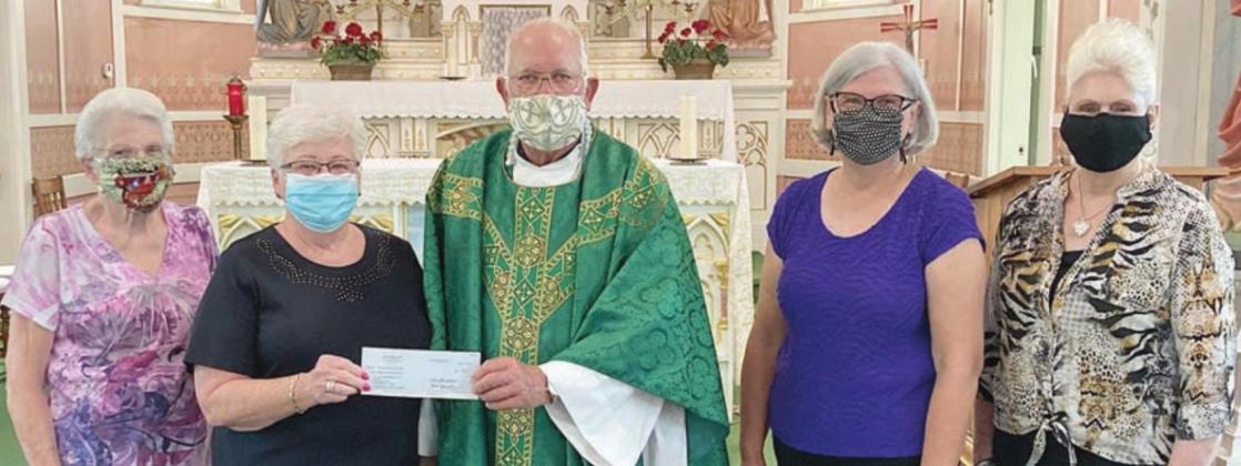 KJZT donates to Ammannsville Catholic Church