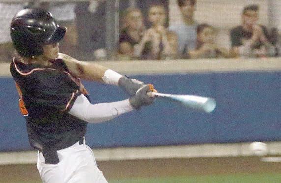 Jayse Janda connects for a walk-off, RBI-single in the bottom of the seventh of game three. Sticker Photo By Darrell Vyvjala