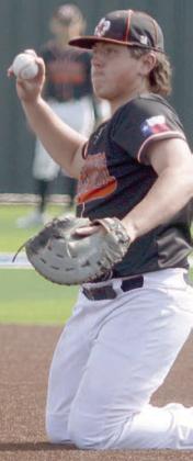 First baseman Ian Reeves throws from his knees to pitcher Owen Brenek in game one after making a diving stop. Sticker Photo By Darrell Vyvjala