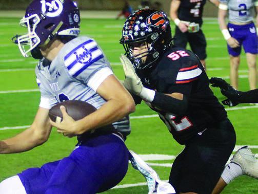 Max Hernandez runs Ryder Balmos out of bounds for a 5-yard loss in the first quarter. Sticker Photo By Layne Vyvjala