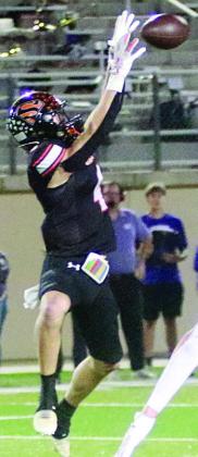 Jayse Janda makes a leaping catch for a 15yard reception in the second quarter. Sticker Photo By Layne Vyvjala