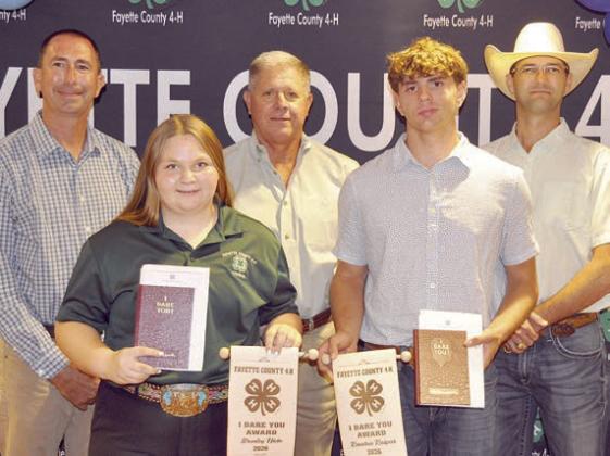I Dare You Award Winners – (front row, from left) Brealey Nieto and Kandon Kaspar. Presenters (back row, from left) Commissioners Jason McBroom, Harvey Berckenhoff and Clint Sternadel.