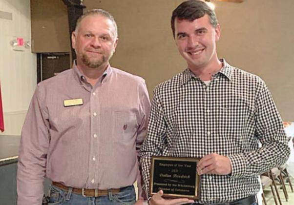 Zapalac presents the Employee of the Year award to Dalton Friedrich. Sticker Photo By Dale Manning