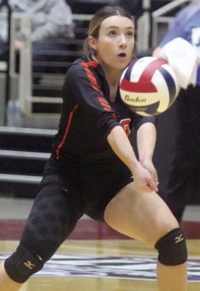 Keaton Walker sends a pass on its way in the second set. Sticker Photo By Darrell Vyvjala