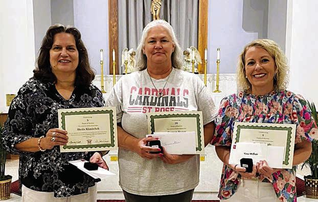 St. Rose of Lima Catholic School presented service milestone awards on Thursday, May 16 to three staff members – (from left) Sheila Klimitchek, grades 3-4 teacher, 5 years of service; Carmen Stoner, aide/cafeteria, 10 years of service; and Kacy McBride, grade 1 teacher, 5 years of service. St. Rose thanks all teachers and staff for their dedication and service to the essential resource for our future – children.