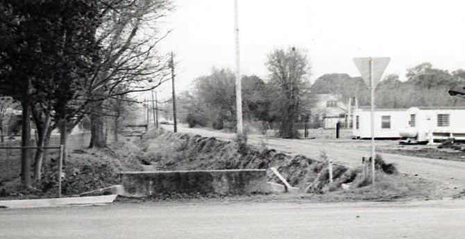 Dr. Leland F. Zatopek took this photograph at the intersection of Jackson Street with Live Oak and Eblin streets in La Grange in 1978 before Beef Head Ditch was covered. Photo Courtesy of Fayette Heritage Museum &amp;amp;Archives, La Grange